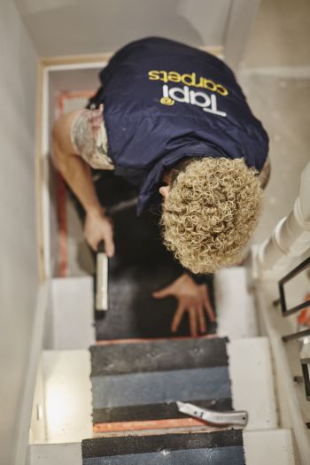 Tapi Fitter fitting carpet